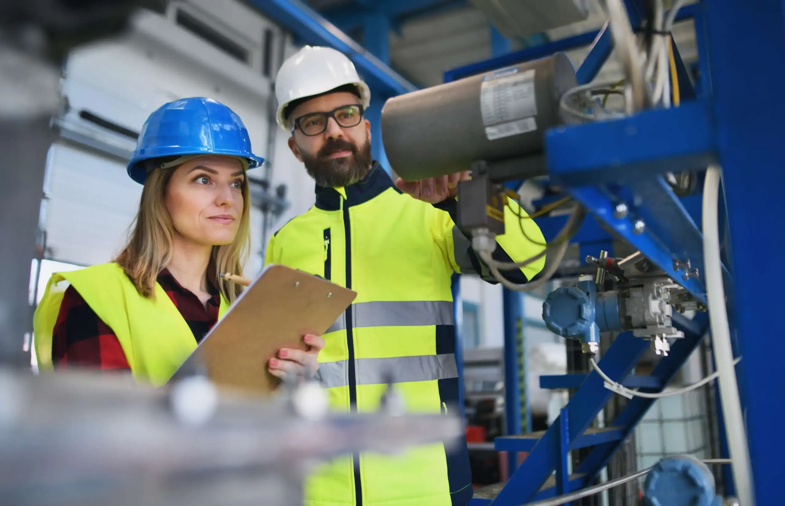 engineering-manager-and-mechanic-worker-at-manufacturing-industry